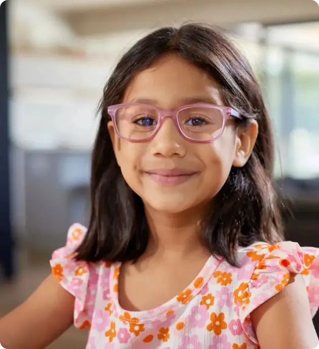 Smiling girl wearing pink glasses